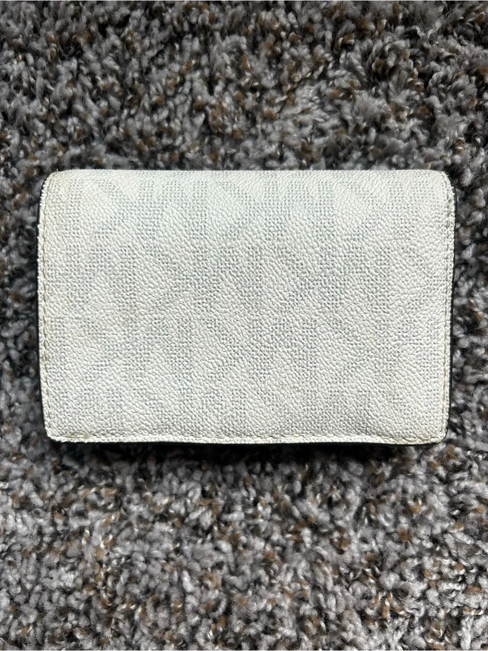 Michael Kors Pebbled Leather Fold-Over Wallet in Off-White with Silver Logo